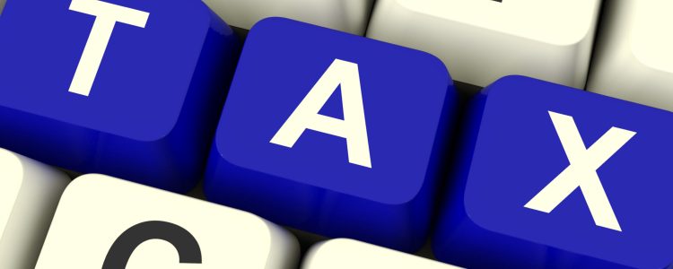 Tax Computer Keys Showing Taxation And Online Payment