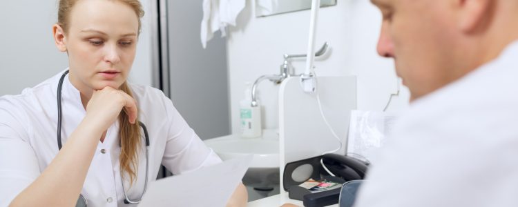 Doctor and nurse discussing analyses