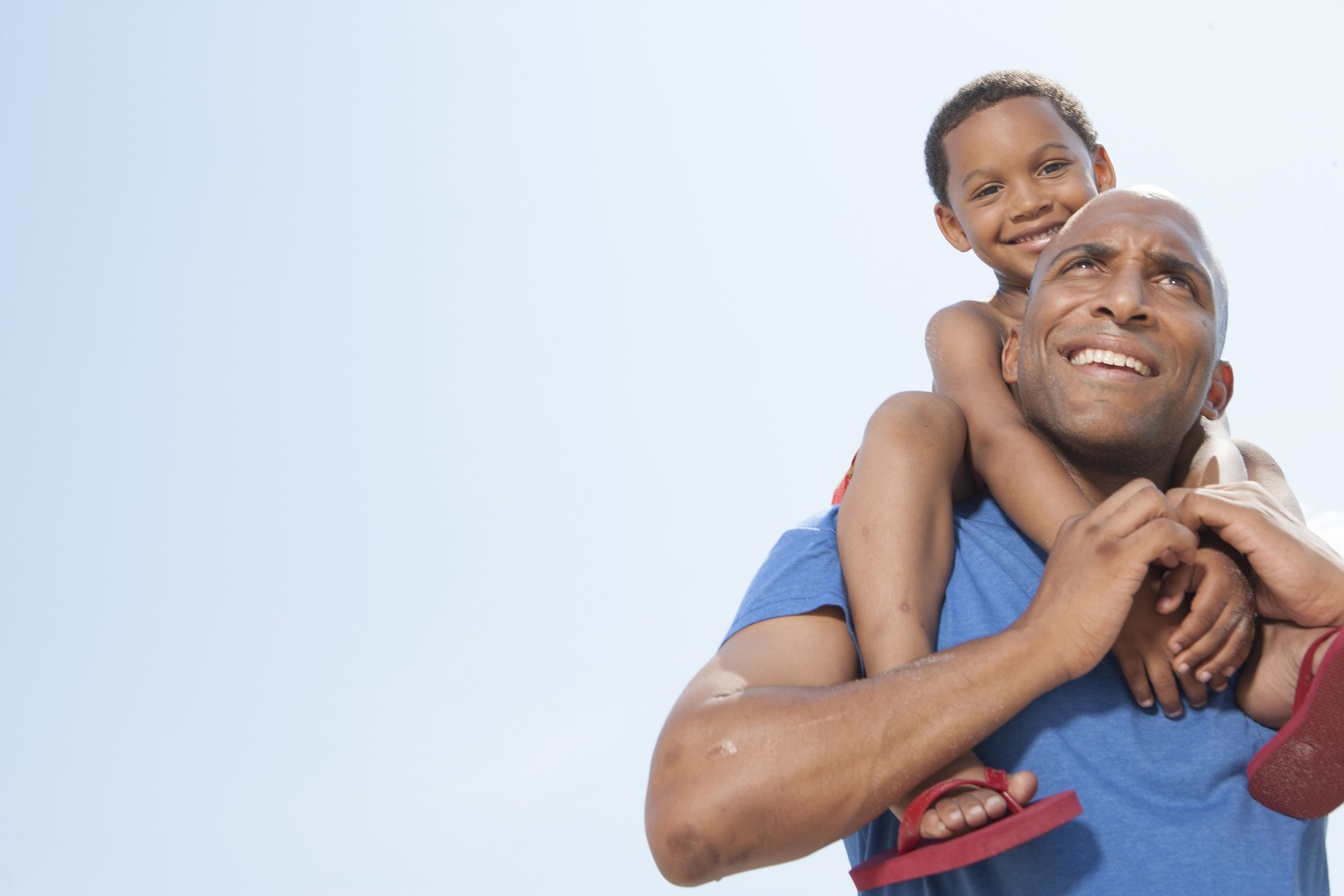 Child with parent at the beach