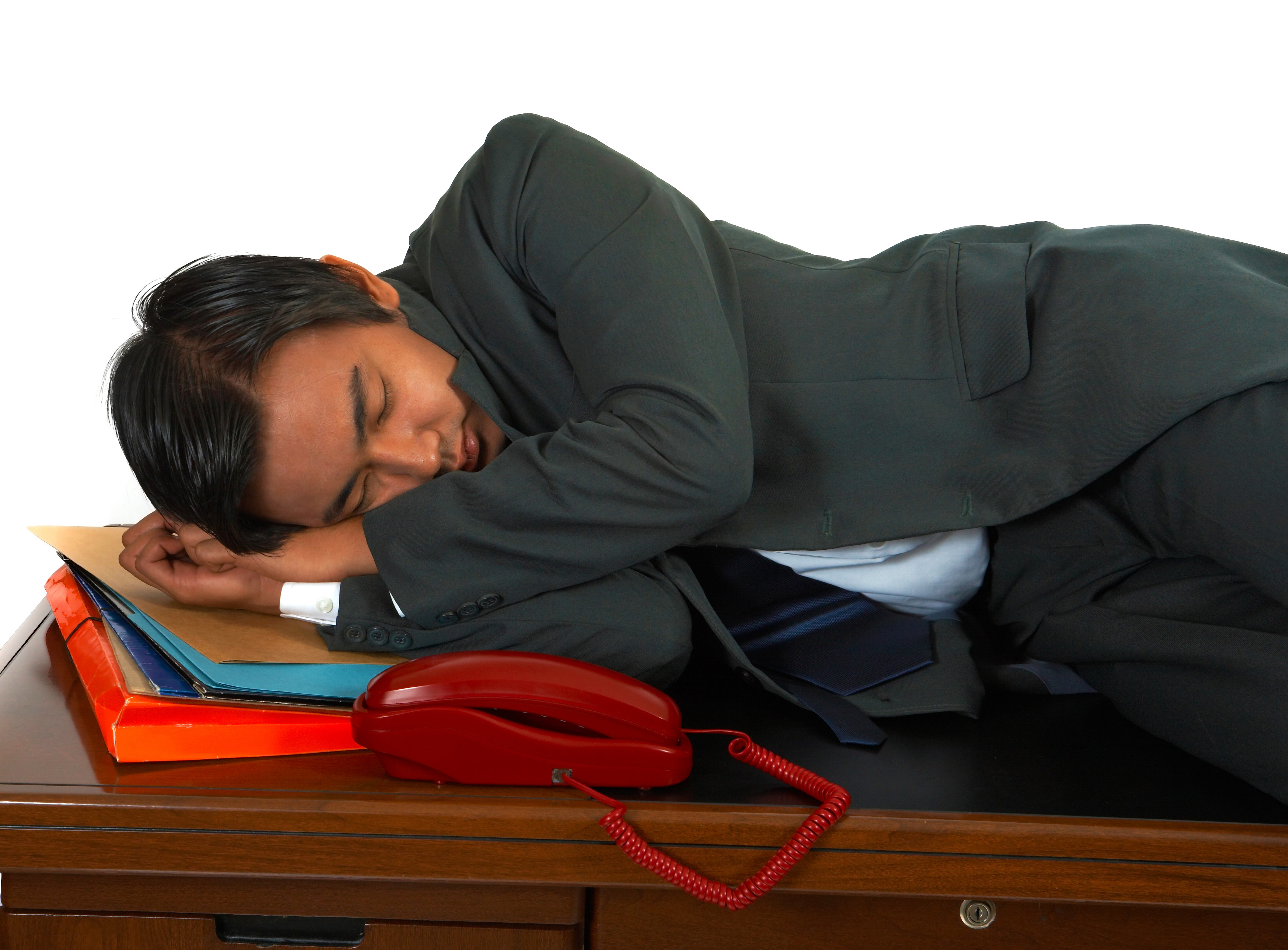 Tired Businessman Lying On His Desk
