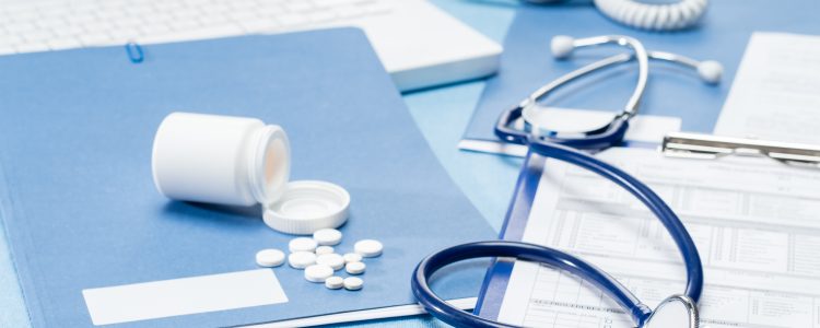 Doctor’s office desk with medical accessories