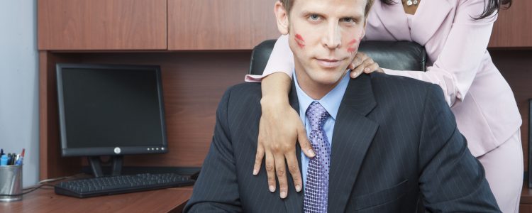 Woman seducing man in office