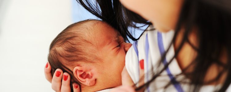 Mother Breastfeeding her newborn baby