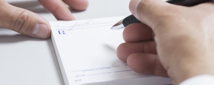 Doctor writing prescription